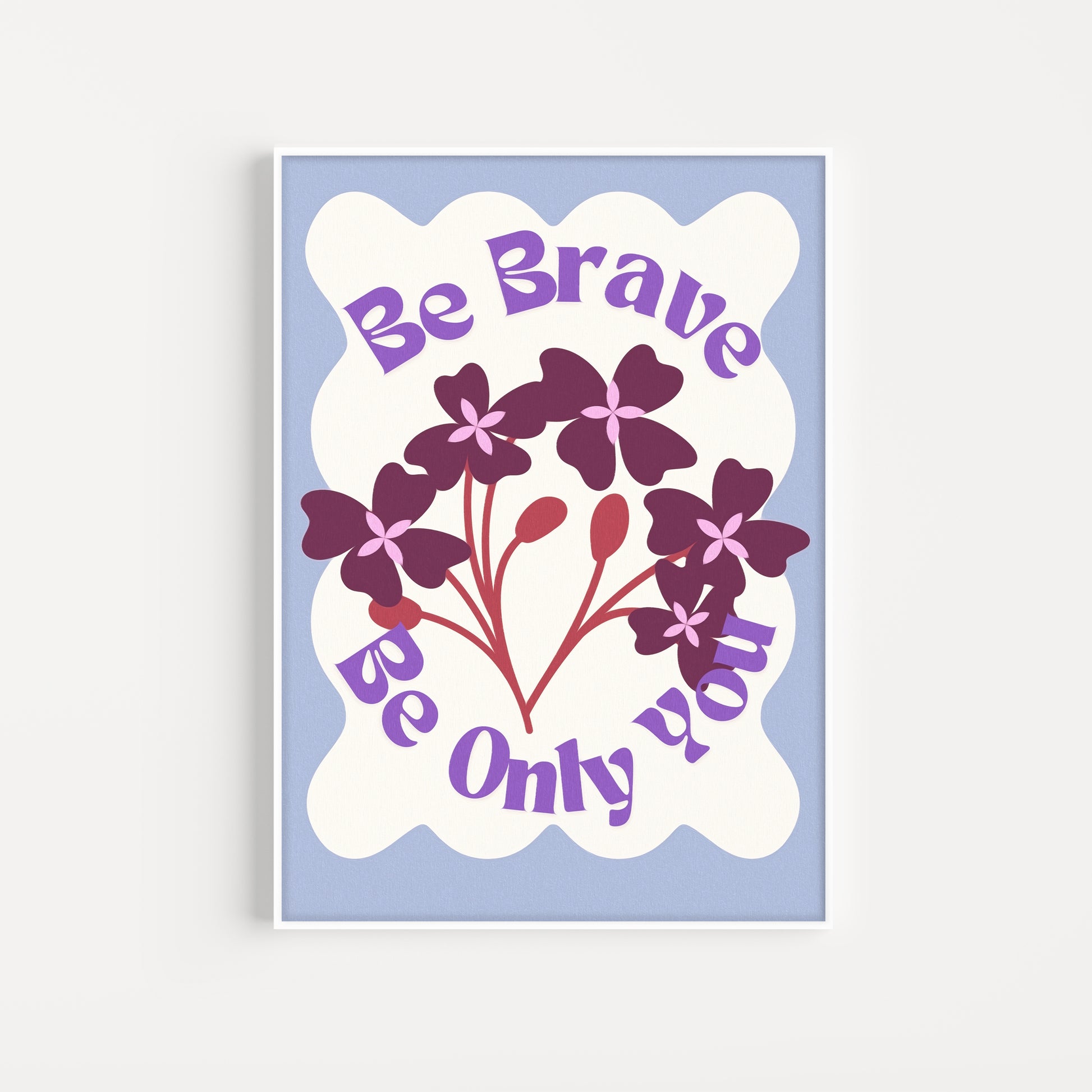 An art print with a floral design and the text 'Be Brave Be Only You' printed on it.