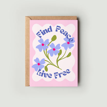 A greeting card with a floral design and the text 'Find Peace Live Free' on the front, accompanied by a kraft envelope.