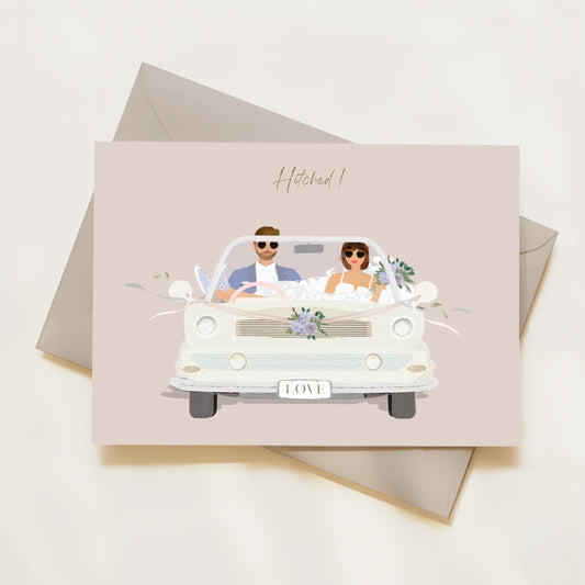 Wedding card with illustration of a couple in a car, with the bride wearing converse style trainers, on a light background