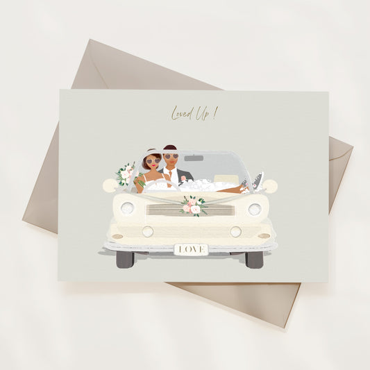 Card with illustration of a couple in a wedding car, envelope on a light background