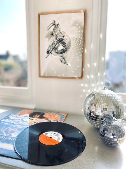 Spin Me Round (Like A Disco Ball)